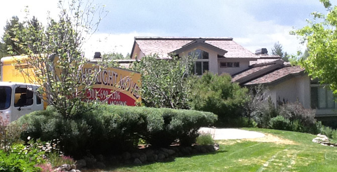Moving Truck In Front of Home